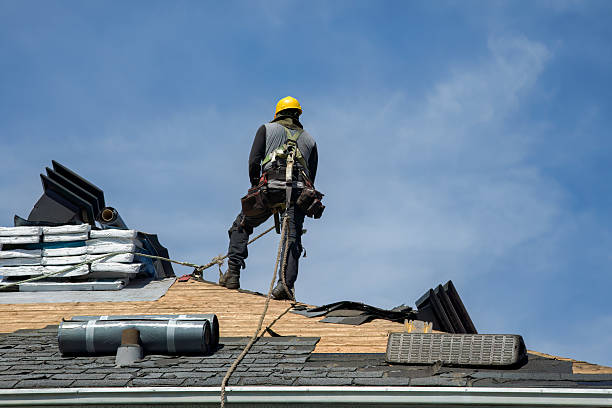 Professional Roof Replacement technician working in Lee, MA